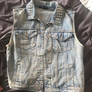 Denim vest with studded collar